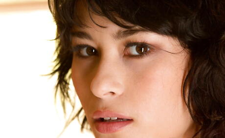 Very attractive american cutie Raven Rockette exhibits big boobs and hairy twat 